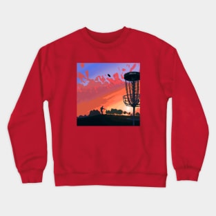 Disc Golf Against a Reddish Sunrise Crewneck Sweatshirt